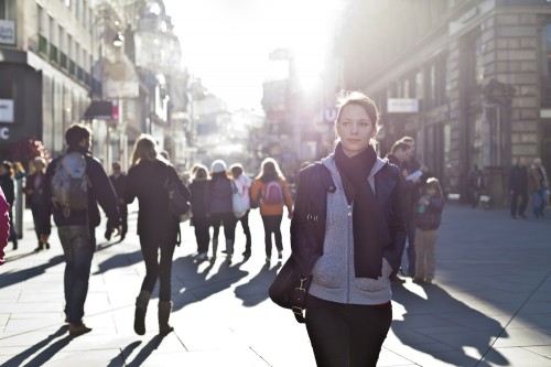 Girl walking on city street