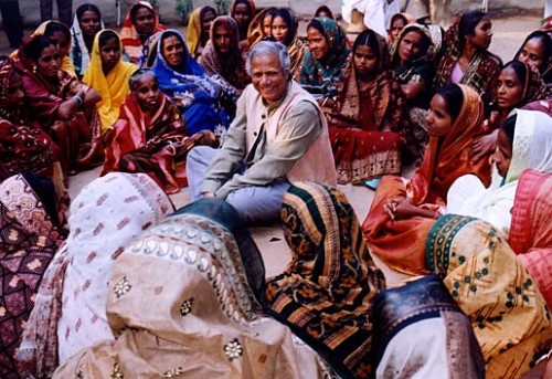 Muhammad Yunus visits Grameen Bank Centers and loan holders, who are mostly women. Copyright © Grameen Bank Audio Visual Unit, 2006