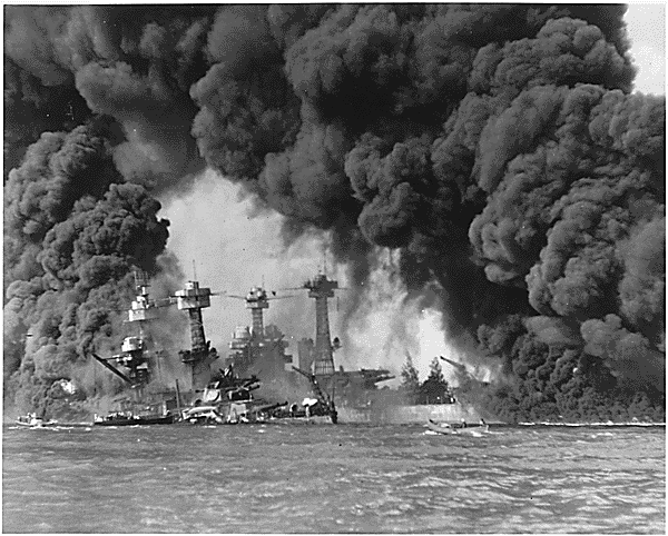Battleships USS WEST VIRGINIA and USS TENNESSEE after the Japanese attack on Pearl Harbor on Dec. 7, 1941.