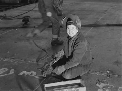Lady welder in a California shipyard