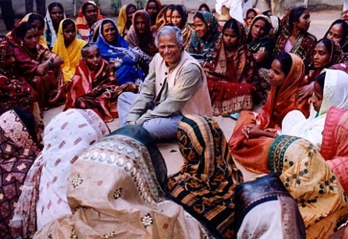 Muhammad Yunus with Grameen bank borrowers, Copyright © Grameen Bank Audio Visual Unit, 2006
